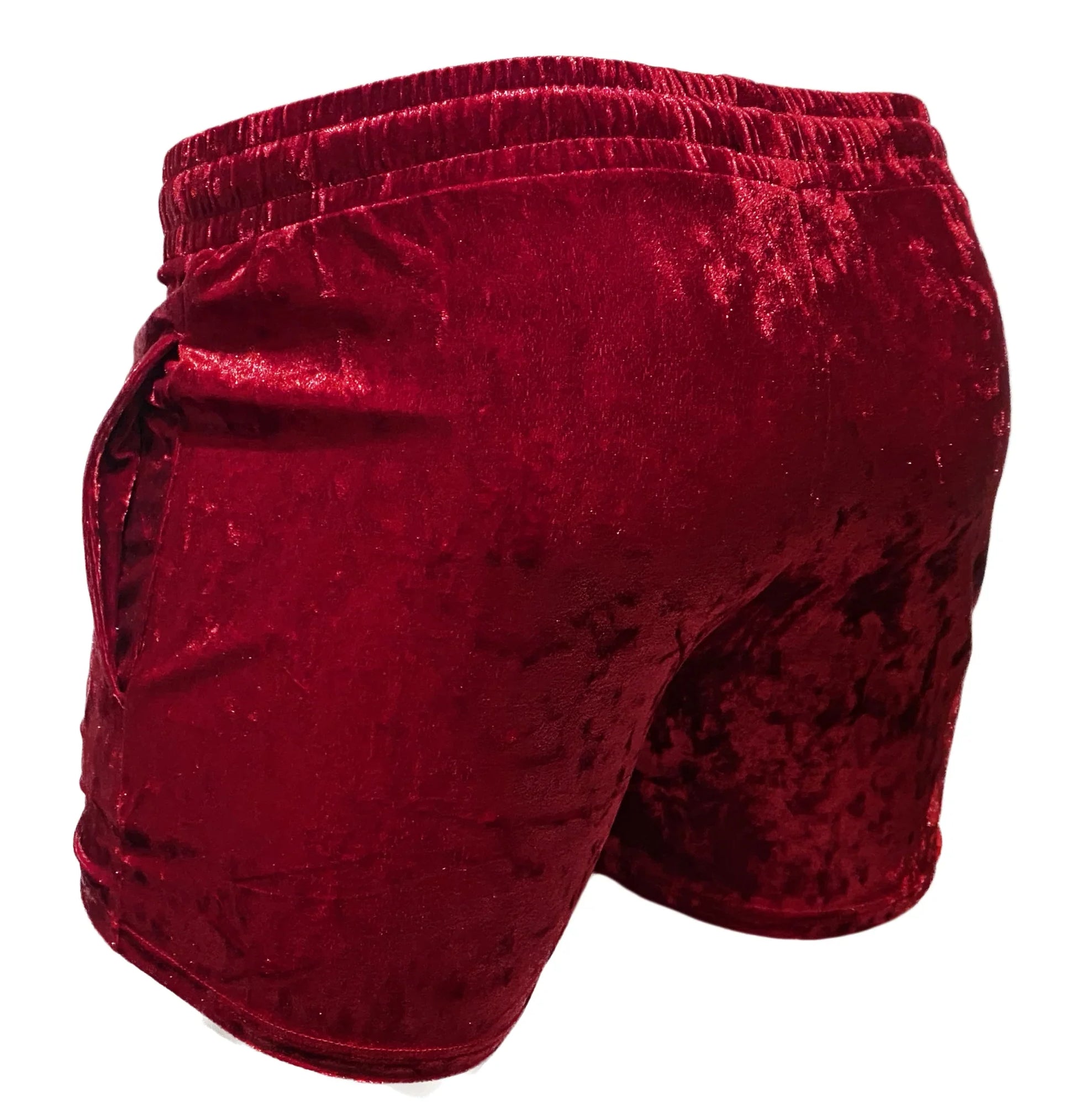 Rich burgundy velvet pocket shorts with plush textured fabric and elastic waistband for comfortable wear