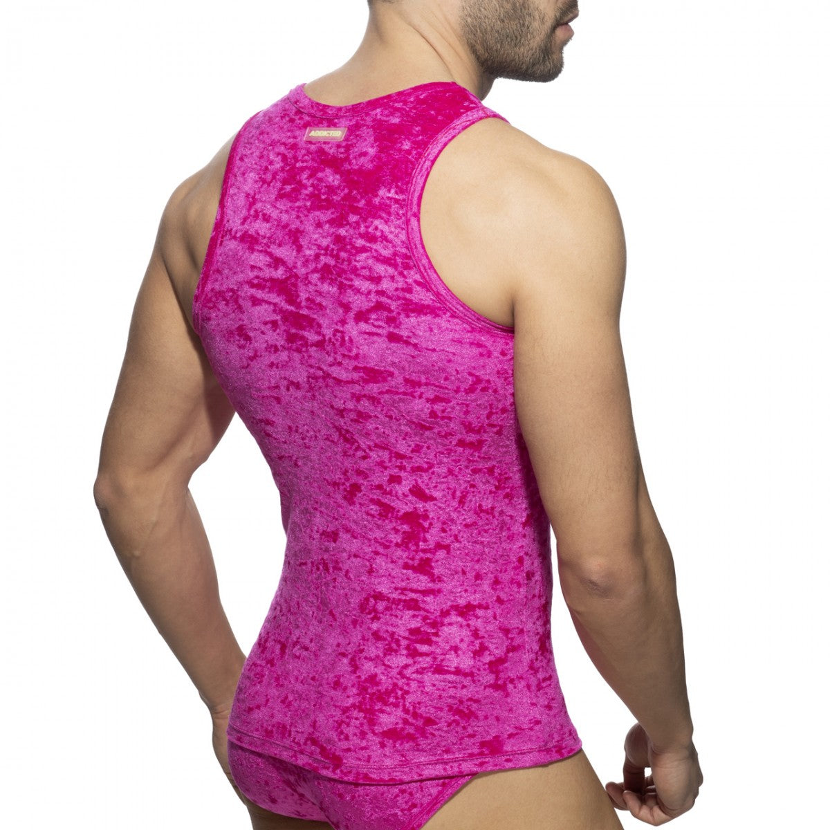 Vibrant fuchsia velvet shady tank top with a textured mottled finish made from soft velvet material