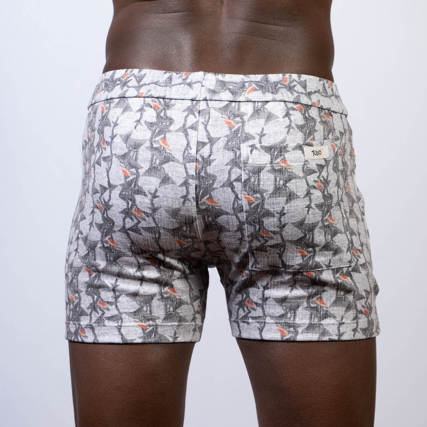 Vintage stripes linen texture shorts in gray and white pattern with subtle orange accent and elastic waistband