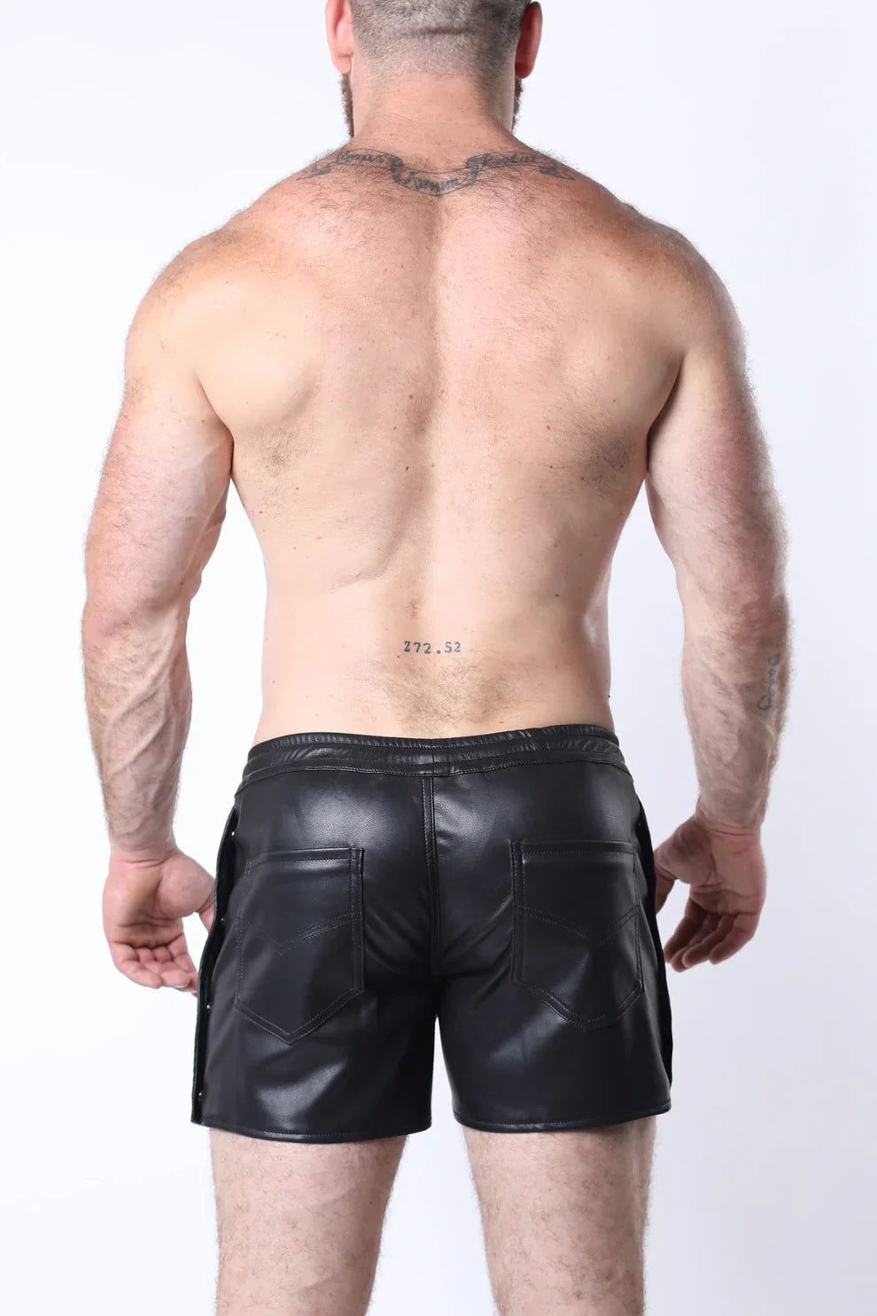 Black leather void snap up short with glossy finish and two front pockets for stylish casual wear