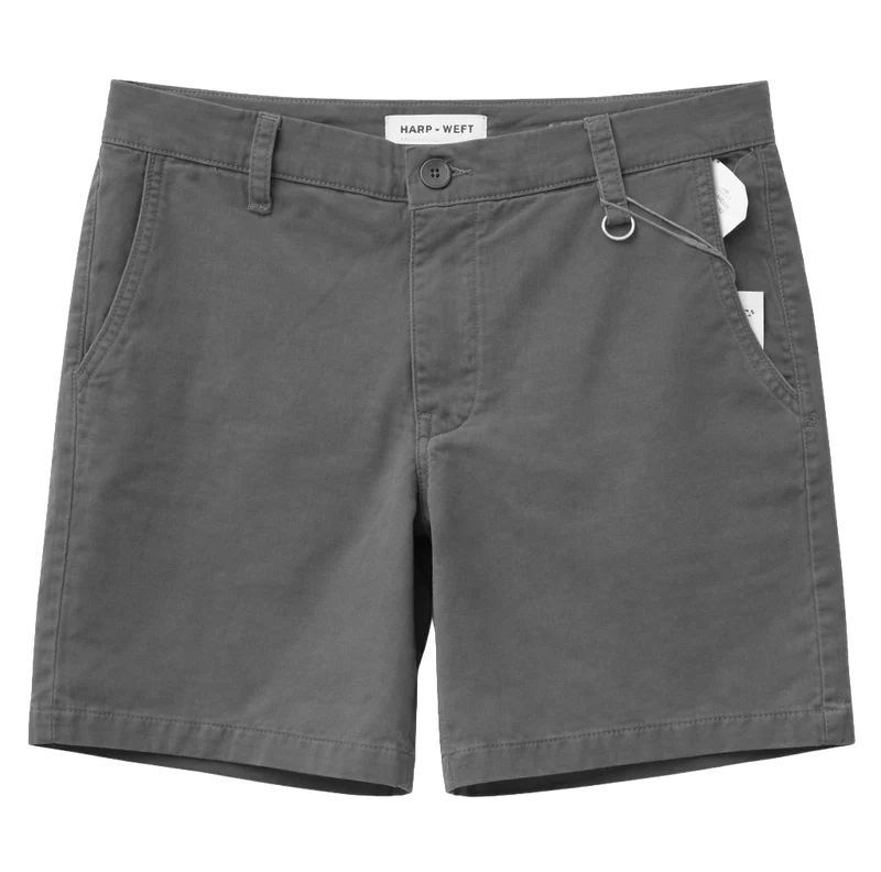 Front view of dark grey Warp + Weft Act Chino Shorts, featuring belt loops, front pockets, and a metal D-ring.