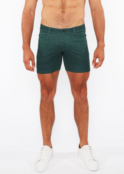 Dark green washed denim stretch knit shorts with textured fabric and classic five-pocket design for casual wear