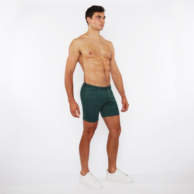 Dark green washed denim stretch knit shorts with classic five-pocket design and belt loop detailing