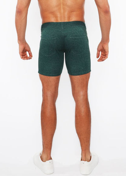 Dark green washed denim stretch knit shorts back side with subtle textured pattern and two back pockets