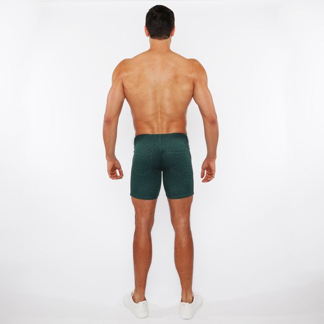 Dark green washed denim stretch knit shorts with textured fabric and fitted cut for casual wear