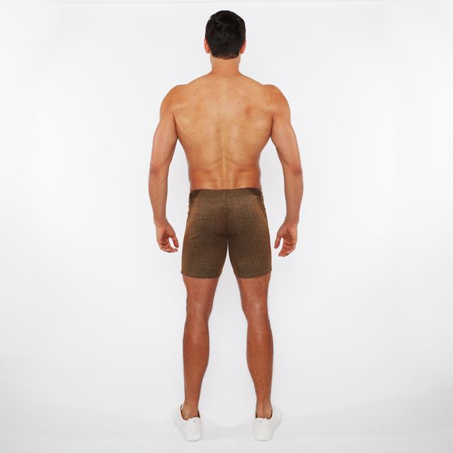 Brown washed denim stretch knit shorts with a subtle textured pattern and a form-fitting design