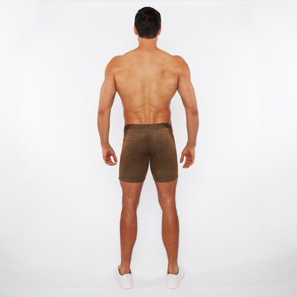 Brown washed denim stretch knit shorts with a subtle textured pattern and a form-fitting design