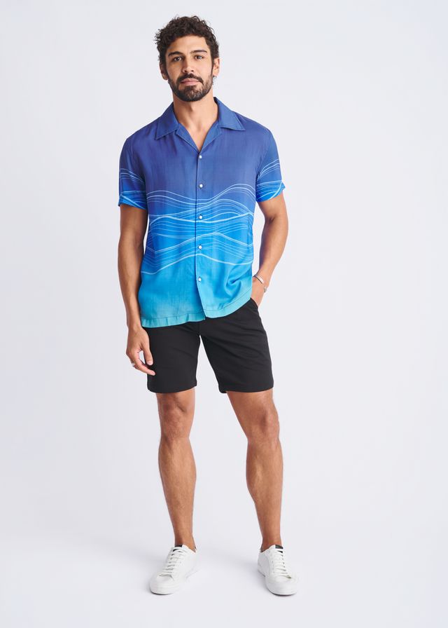 Blue gradient short-sleeved modal shirt with white wavy line print featuring waves border design