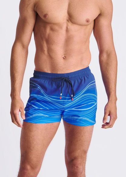 Blue waves print swim shorts with white wavy patterns black drawstring ties and mesh lining for swimming