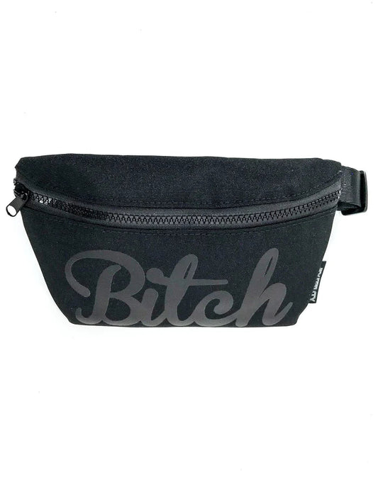 Black canvas ultra slim fanny pack with gray cursive bitch logo and black zipper from WERDS