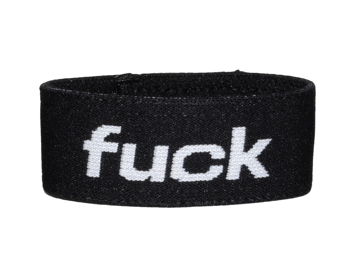 Black elastic band with the word "fuck" in white text on the front.