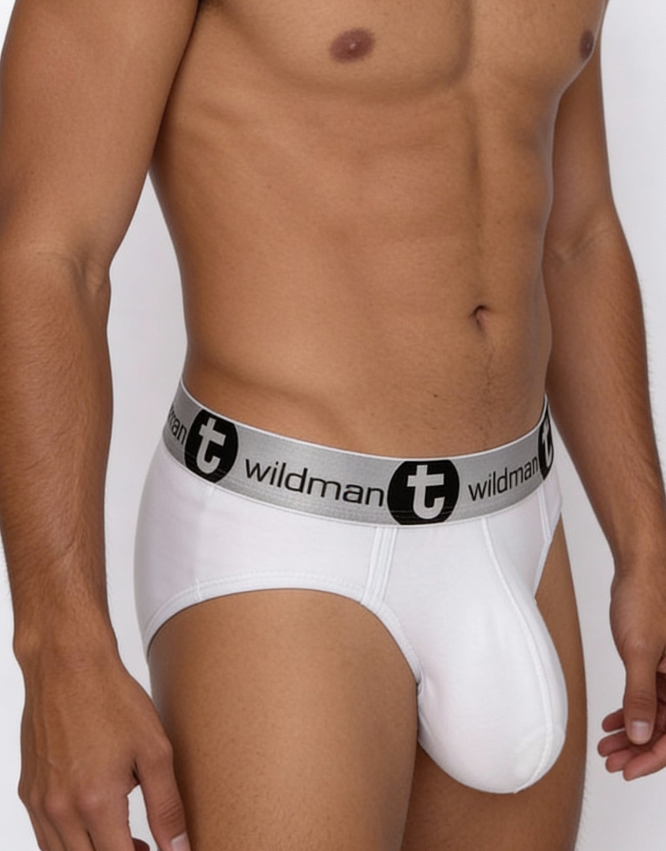 White men’s modal briefs with gray waistband featuring wildman logo and circular emblem in black text