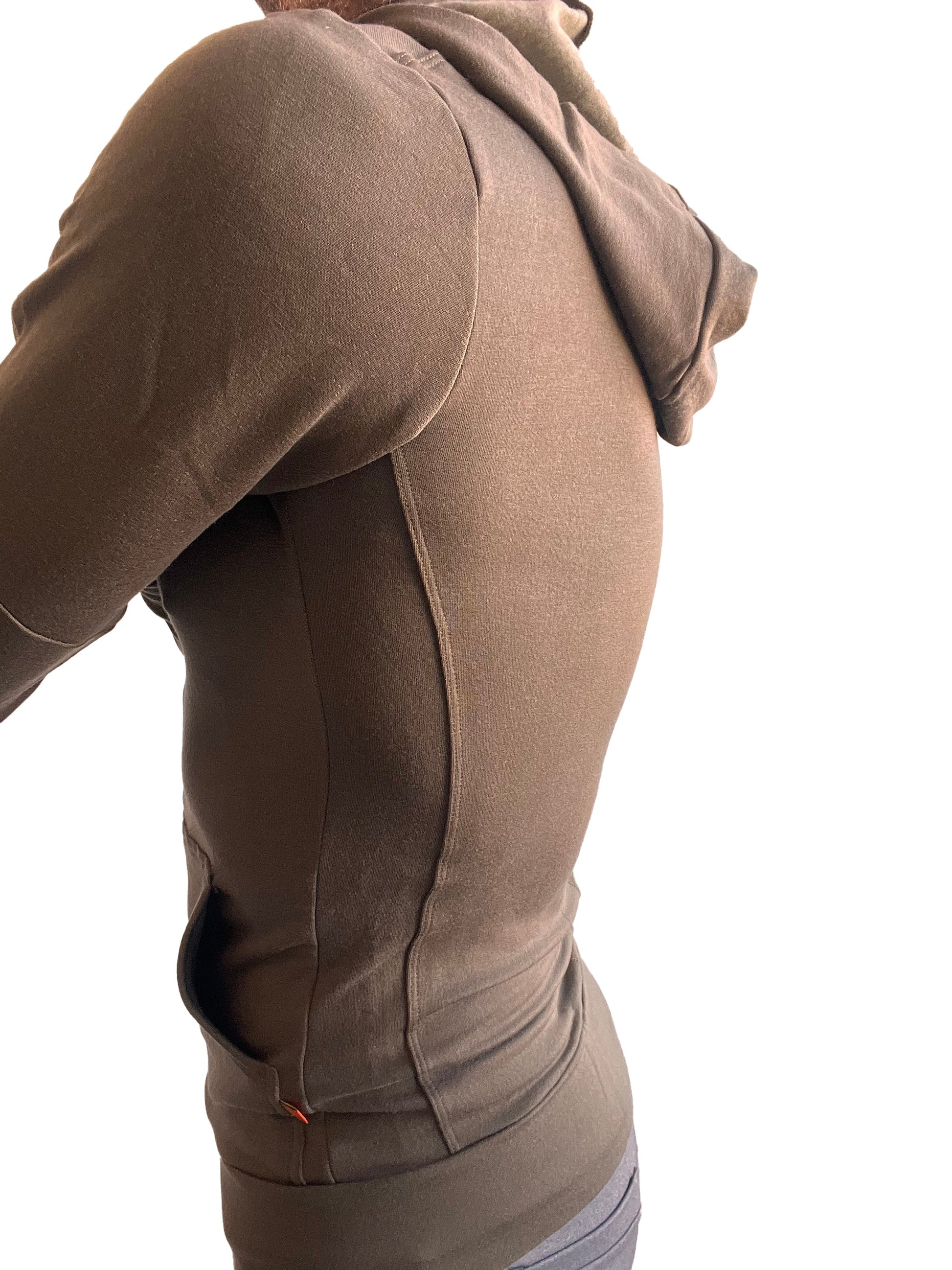 A taupe mid-weight luxury-fleece form-fit hoodie with sleek seams from the winter collection for yoga and track