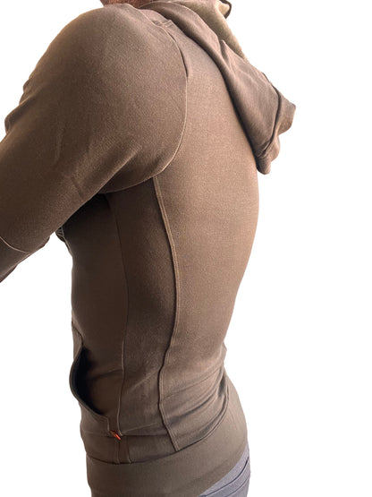 A taupe mid-weight luxury-fleece form-fit hoodie with sleek seams from the winter collection for yoga and track