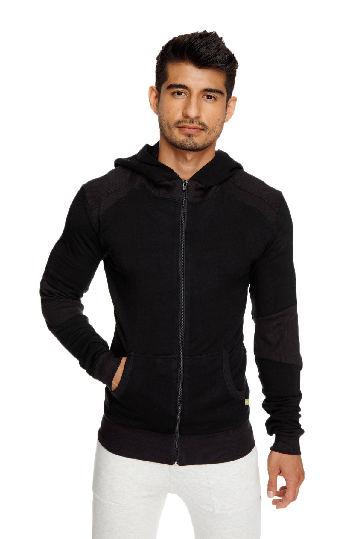 Black mid-weight luxury-fleece form-fit crossover yoga track hoodie with dark panels and yellow tag in winter collection