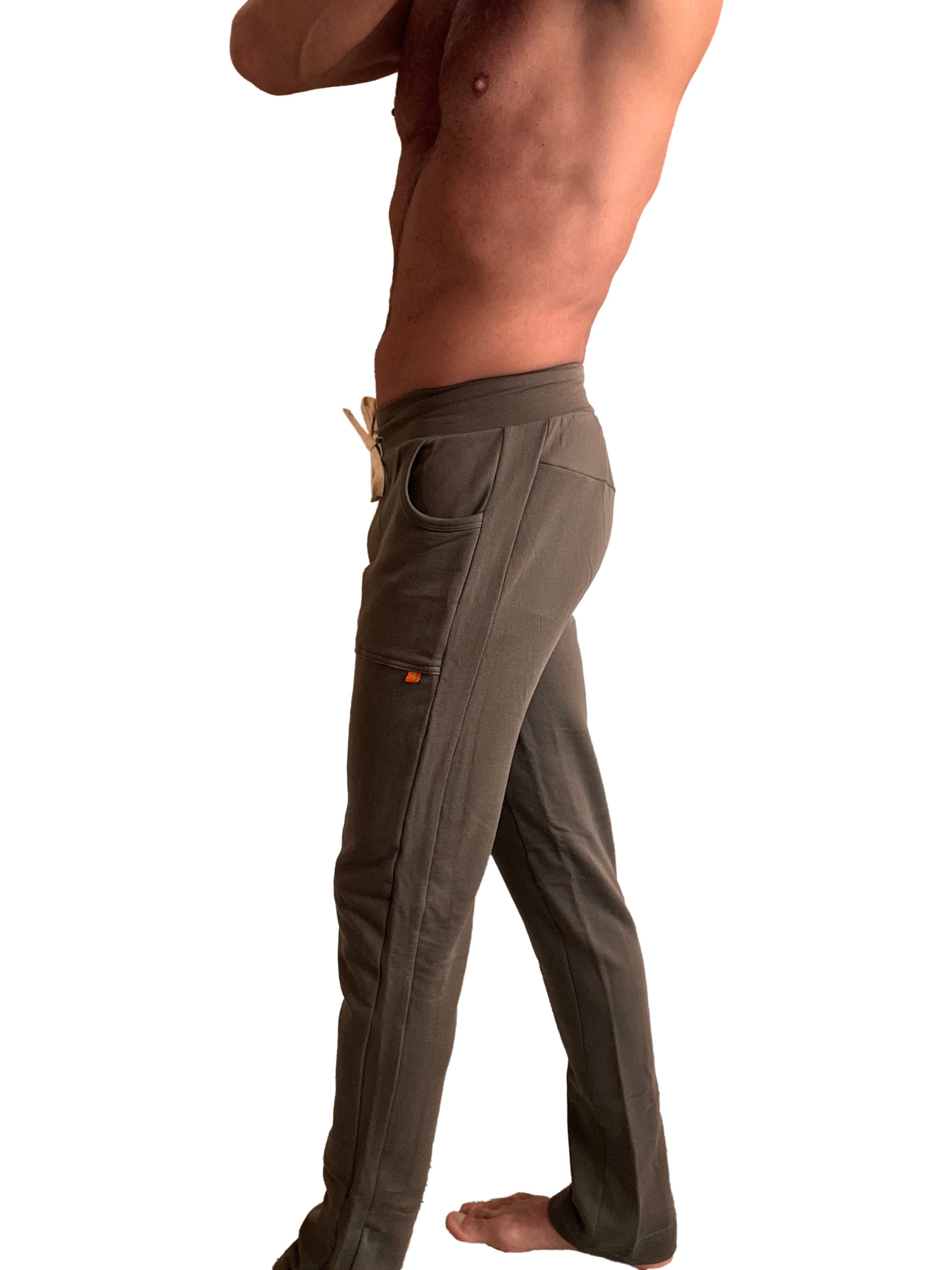 Olive green mid-weight luxury-fleece cargo pants with side pockets and drawstring waistband from winter collection