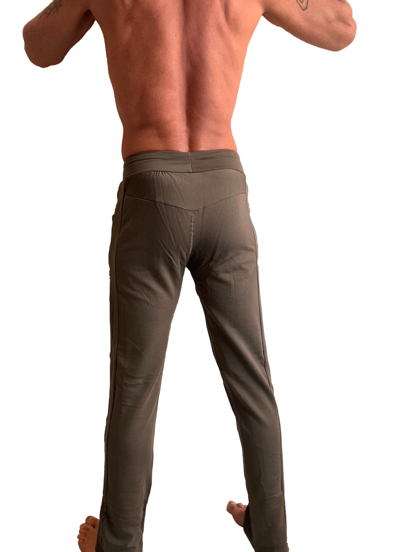 A pair of olive green mid-weight luxury-fleece track pants with slim fit and subtle side seam detailing for winter wear
