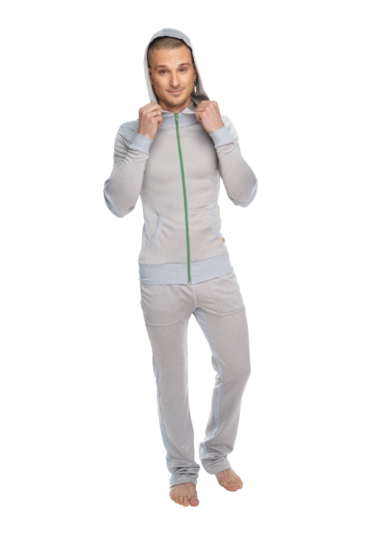 A light gray mid-weight performance-luxe-fleece form-fit yoga track hoodie with green zipper and matching hood