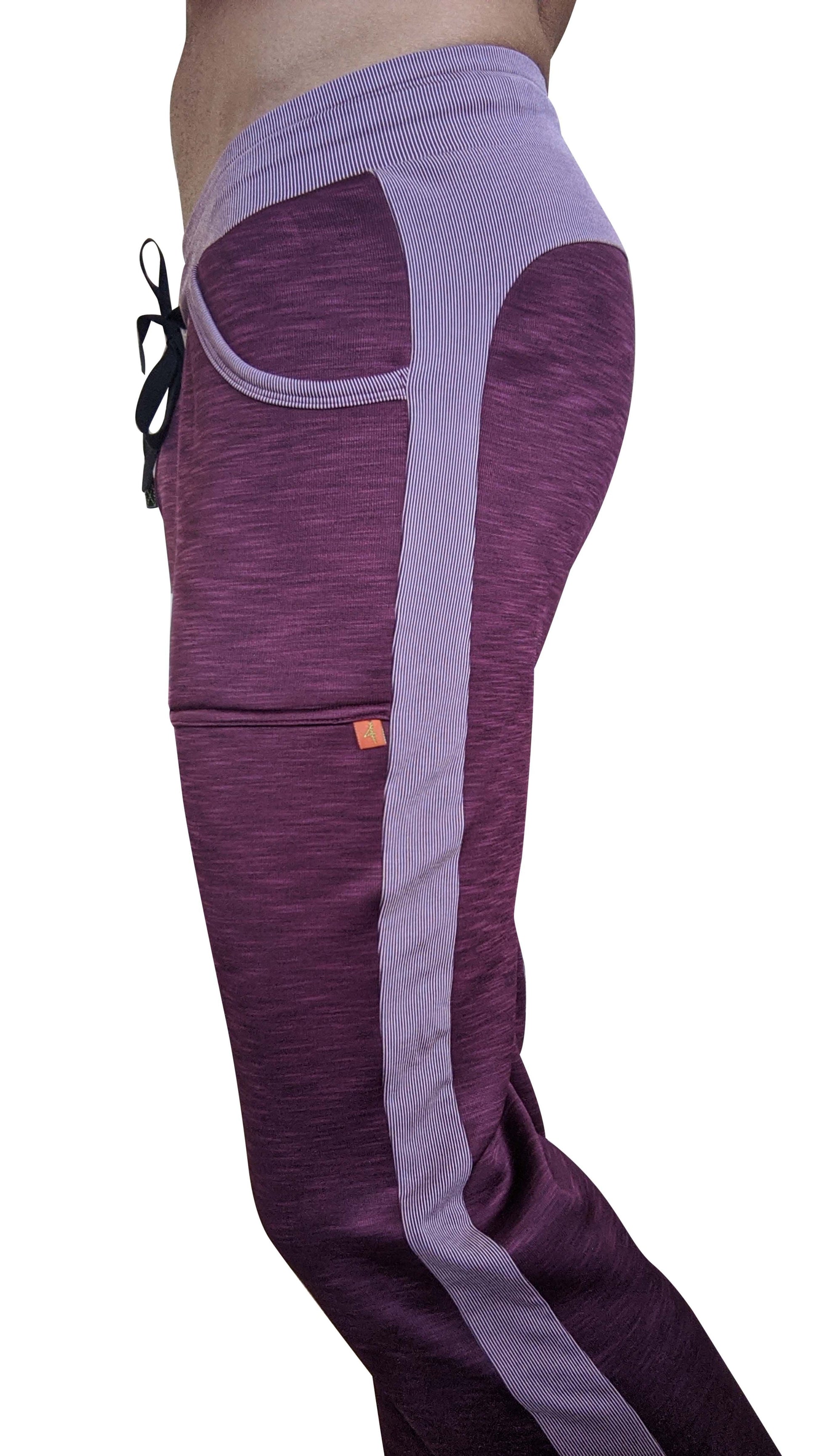 Purple and lavender thick-weight fleece track pants with ribbed side stripe and black drawstring from winter collection
