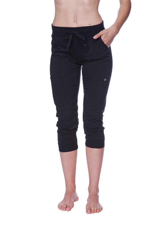 Black capri-length jogger pants with a drawstring waistband and side pockets for women solid black