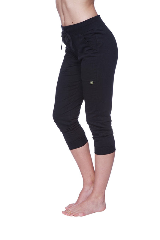 Women’s solid black capri yoga pants with drawstring waistband and subtle side pockets for activewear use