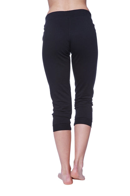 Women’s solid black 3/4 cuffed capri yoga pant with smooth stretchy fabric and elastic waistband