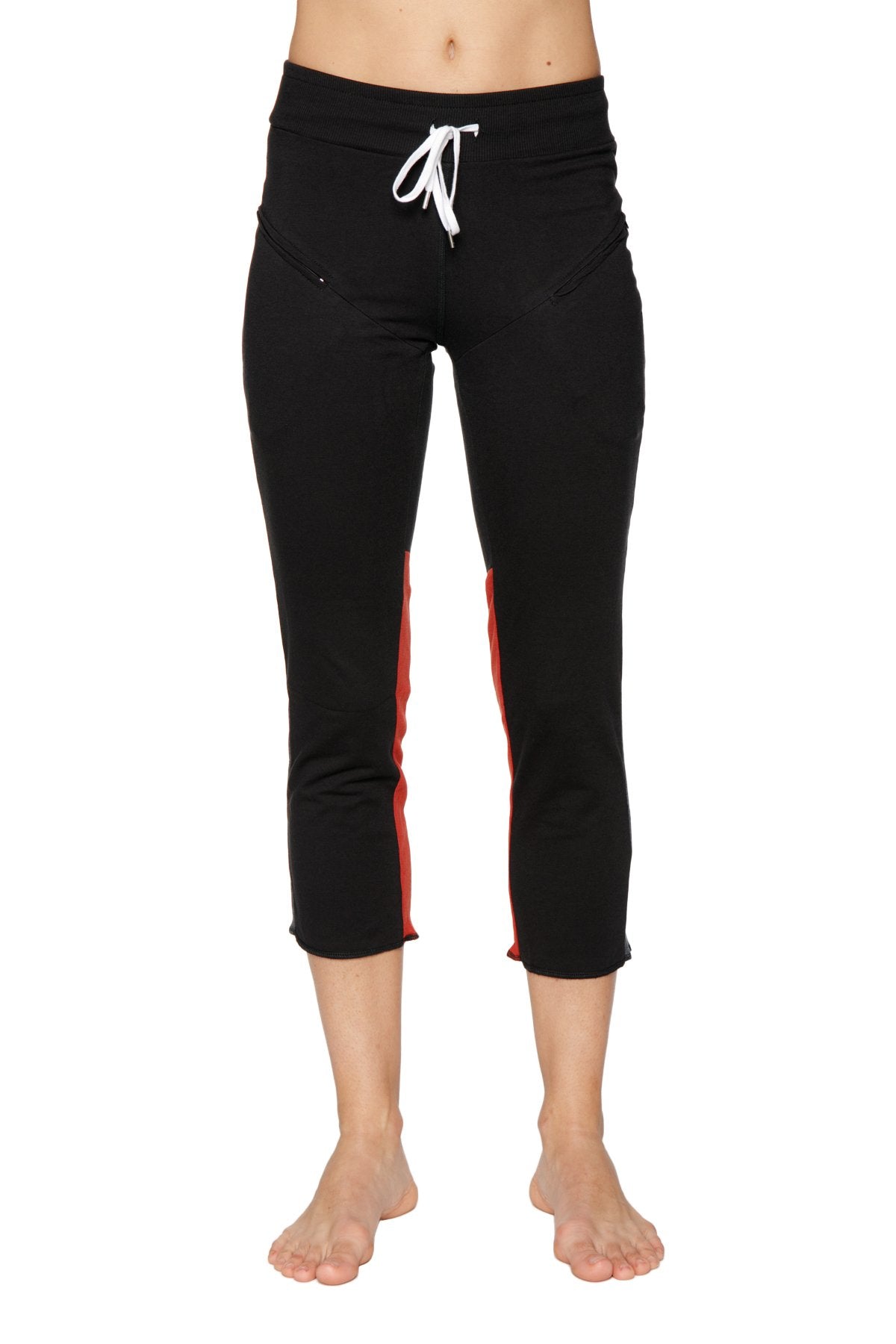 Women’s black 4/5 length capri yoga pants with red side stripes white drawstring waistband and zipper pockets