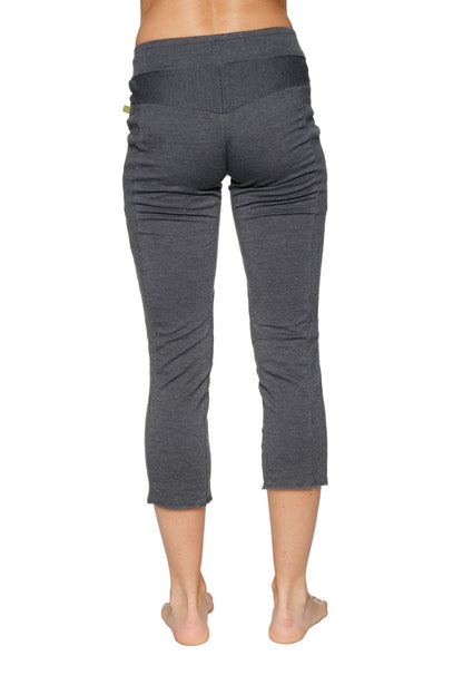 Women’s charcoal 4/5 length capri yoga pants with soft texture and black elastic waistband with zipper pockets