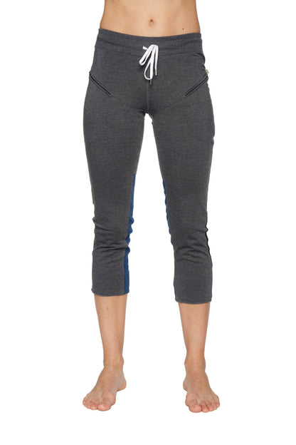 Women’s charcoal capri yoga pants with blue side panels and white drawstring waistband for activewear