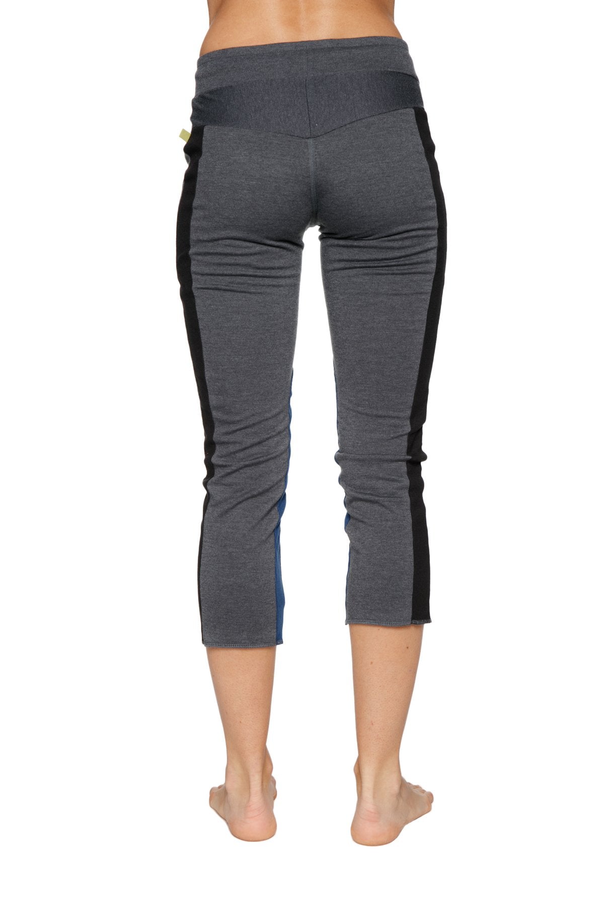 Women’s charcoal gray capri yoga leggings with black side panels blue accent and stretchy waistband for comfort