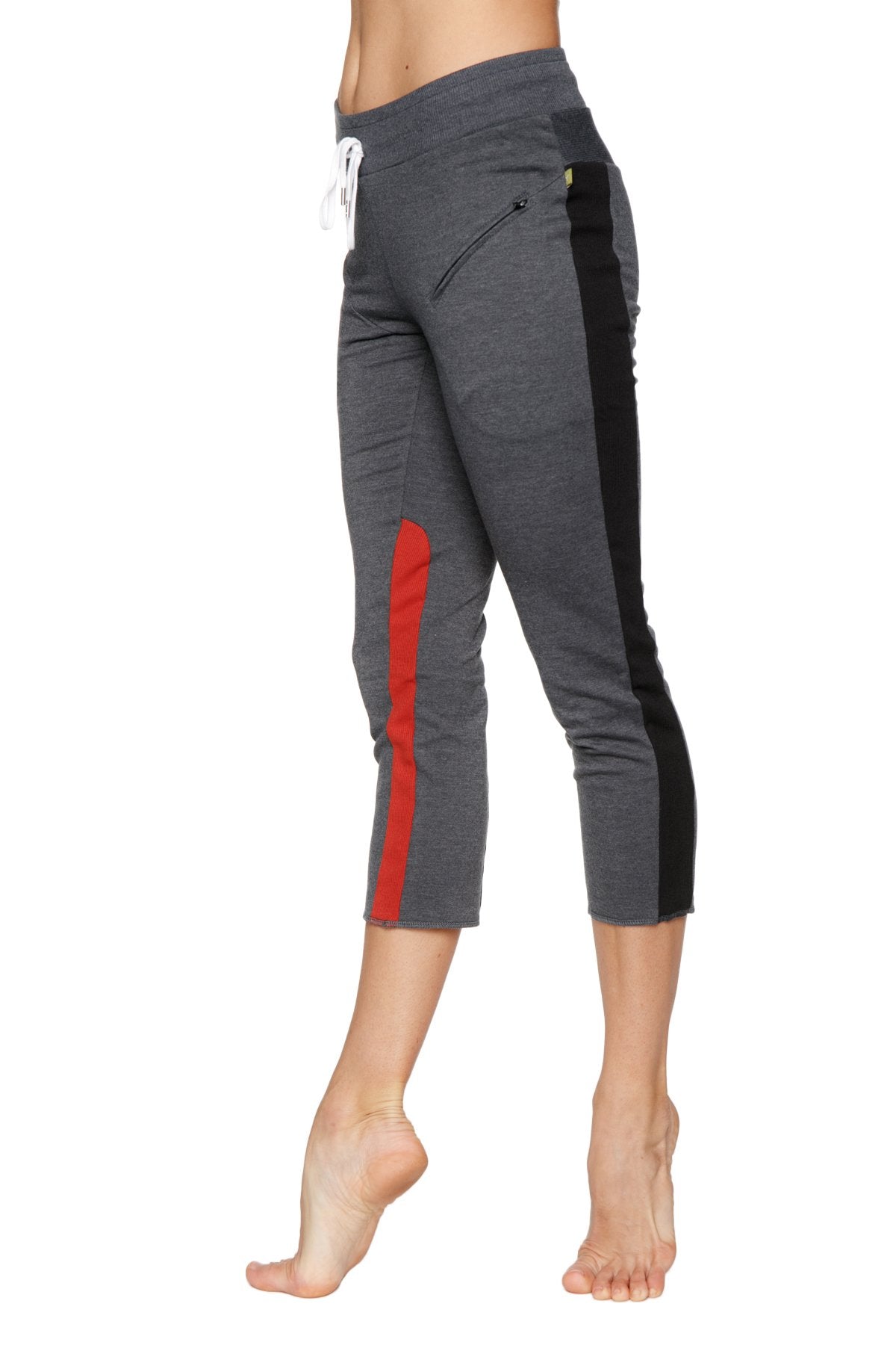 Women’s charcoal gray 4/5 length capri yoga pants with black and red side stripes and white drawstring waistband