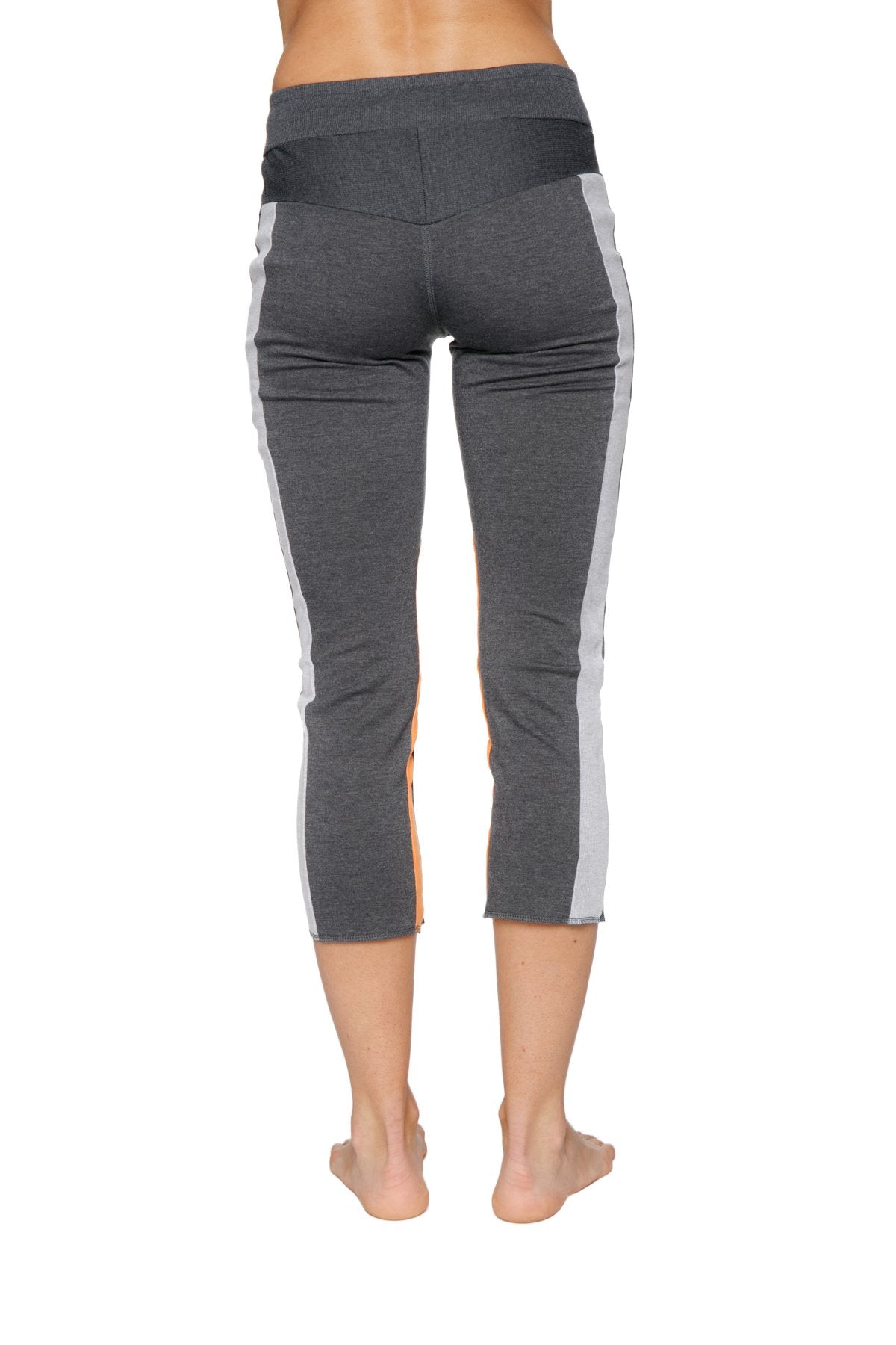 Women’s charcoal capri yoga leggings with white side stripes high waist elastic band and zipper pocket