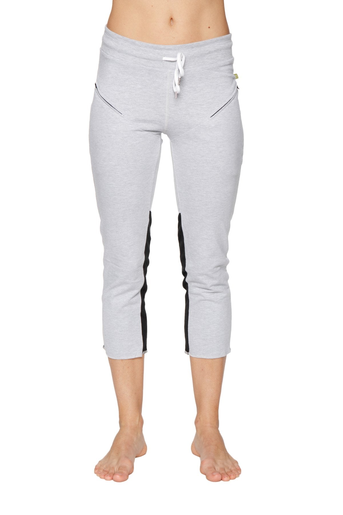 Women’s gray 4/5 length capri yoga pants with black side stripes white drawstring waistband and zipper pockets