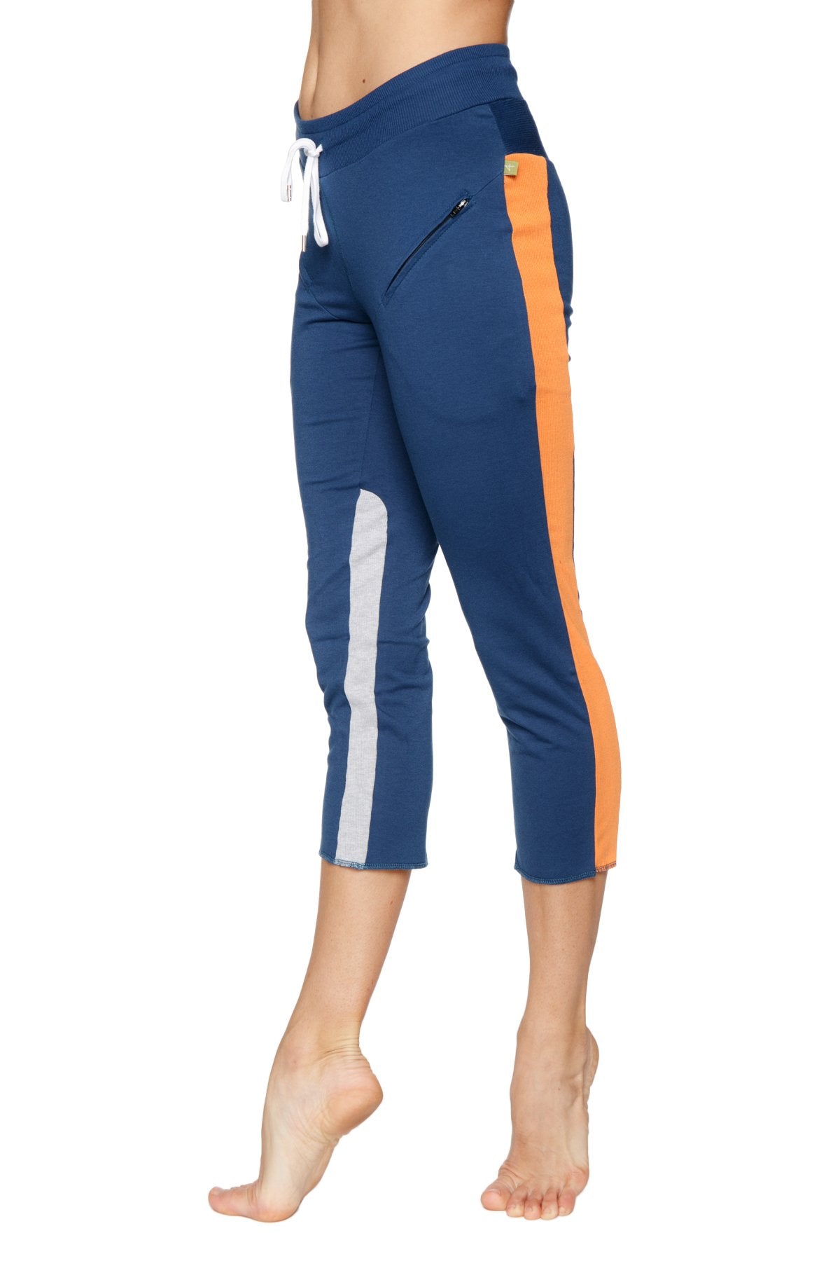 Women’s royal navy blue and orange 4/5 length capri yoga pants with white side stripe and zipper pocket