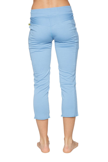 Women’s sky blue high-waisted 4/5 length capri yoga pants with stretchy fabric and subtle side ruching