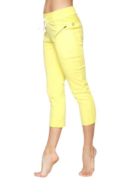 Women’s 4 5 length zipper pocket capri yoga pant in bright yellow with high waist white drawstring and side zipper detail