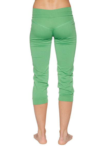 Green cuffed jogger yoga pant with stretchy form-fitting bamboo fabric and elastic waistband in capri length