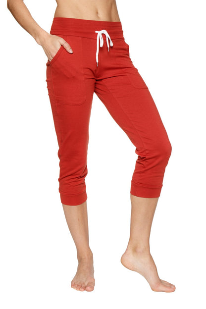 Women’s cinnabar red capri-length jogger yoga pant with white drawstring waistband and side pockets