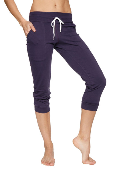 Women’s cuffed jogger yoga pant in navy blue with white drawstring waistband and elastic cuffs for casual wear