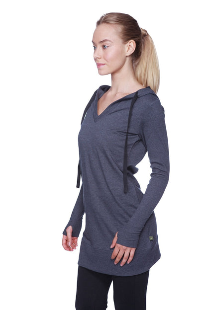 Women’s long body hoodie top in charcoal with black drawstrings featuring a v-neckline and long sleeves