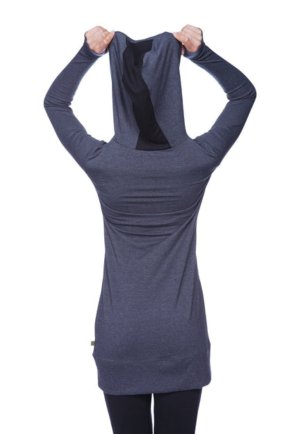 Back view of women’s long body hoodie top in charcoal with black inner lining and subtle ruching at the back