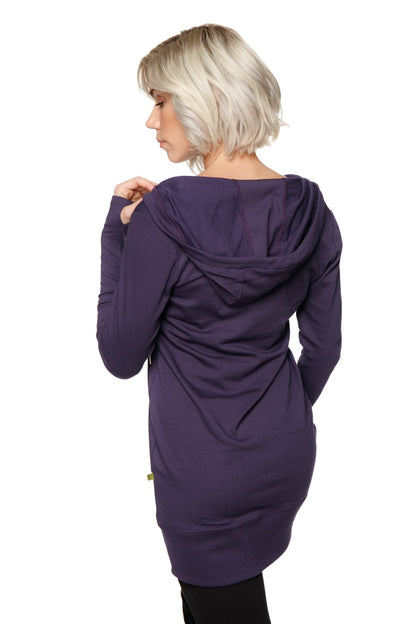 Women’s long body hoodie top in eggplant purple with soft draping fabric and relaxed fit long sleeves