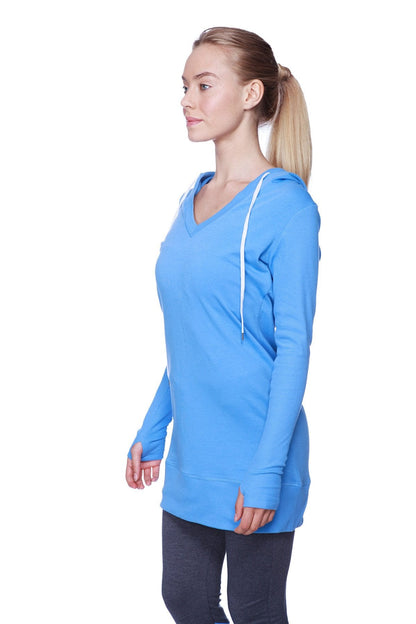A vibrant ice blue women’s long body hoodie top with royal blue v-neck and white drawstrings in long sleeves