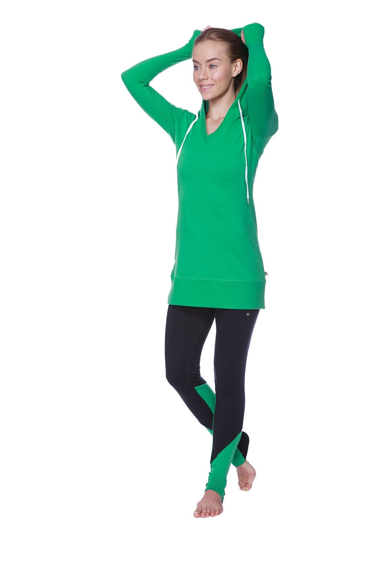 Women long body hoodie top in solid bamboo green with white drawstrings and v-neckline made from soft fabric