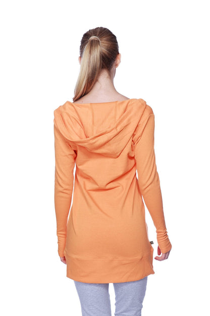 Women’s long body hoodie top in solid sun orange with relaxed fit and ribbed cuffs in soft fabric