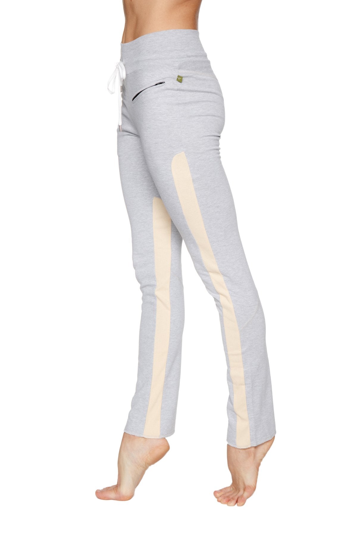 Women’s organic boyfriend yoga training pants in light gray with cream vertical stripes and white drawstring waistband