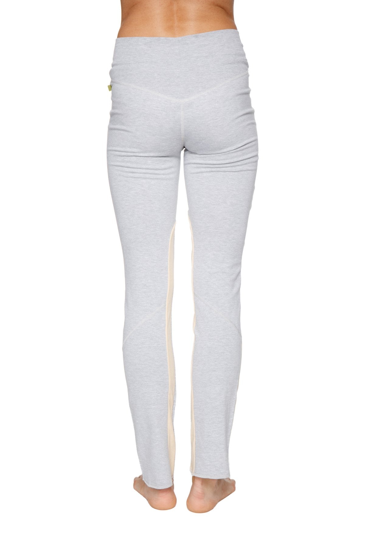 Women’s organic light gray high waisted yoga training pants with subtle vertical seam detail down the outer leg