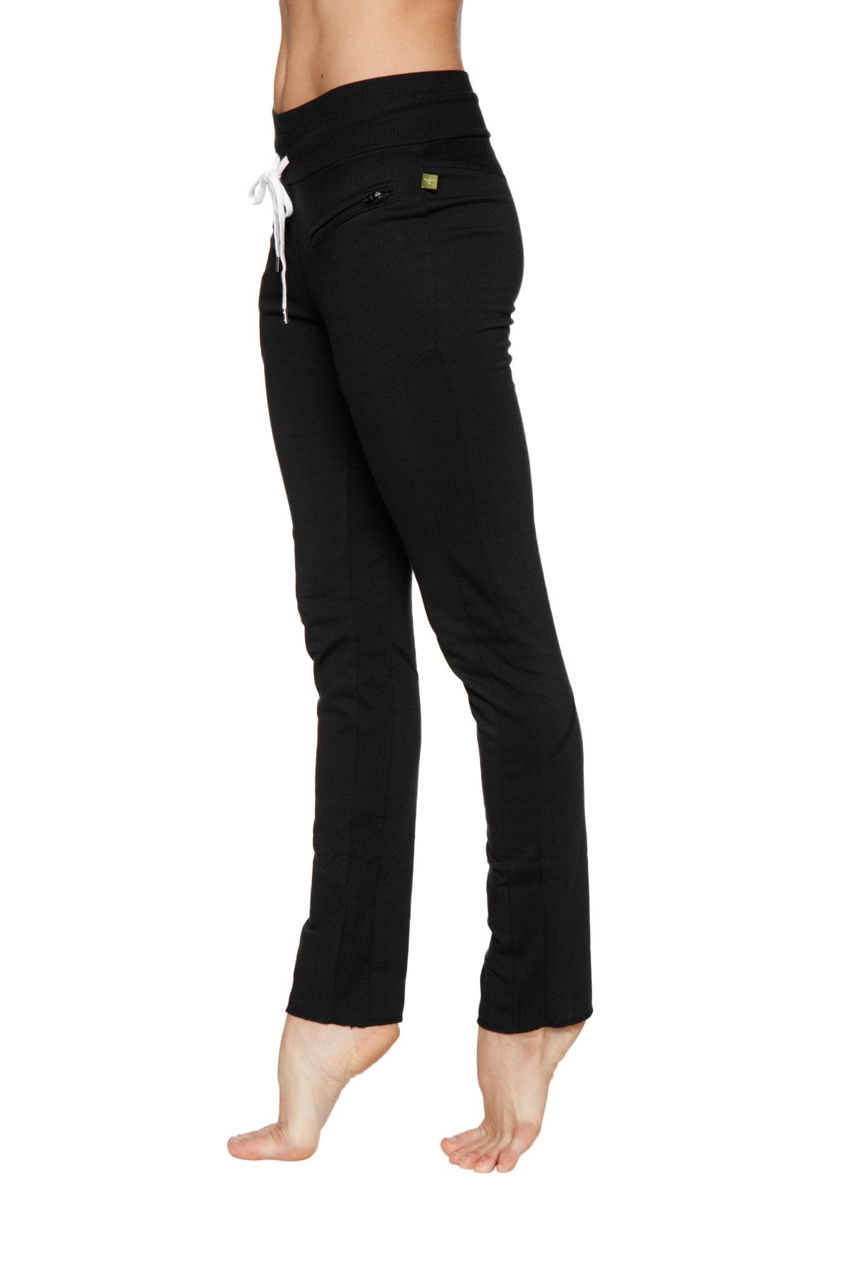 Women’s organic boyfriend yoga training pant in black high waisted with white drawstring and green brand tag