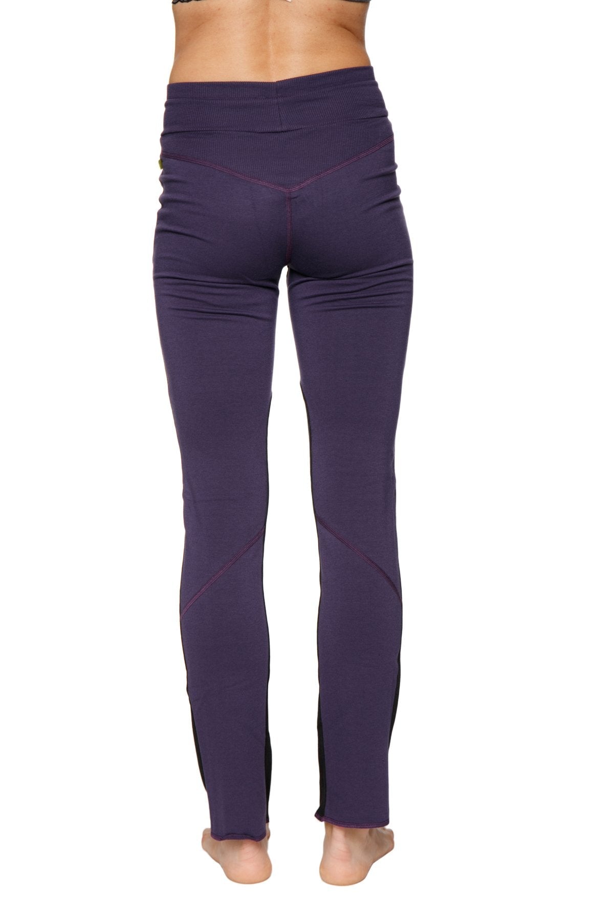 Women’s organic purple high-waisted boyfriend yoga training pant with sleek form-fitting design and side seam detailing