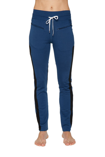 Women’s organic boyfriend yoga training pant in blue with black side stripes and white drawstring waistband